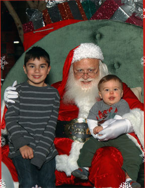 Jake and Duncan visiting Santa.  Duncan didn't even wimper.