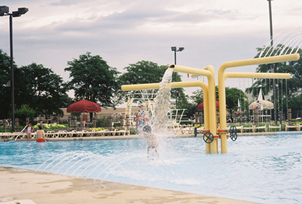 You have to look closely, but this is Jake at our community pool.  I love this picture!  He is under the spray