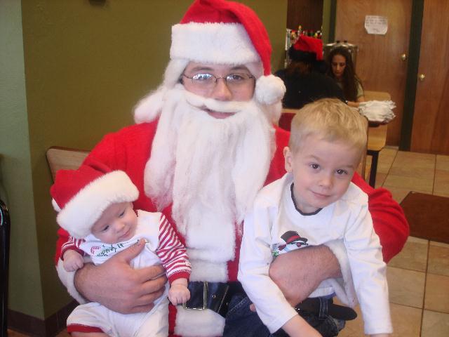 Myles and Tharin with Santa